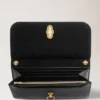Amberley Clutch aus schwarzem, quergenarbtem Leder Amberley Amberley Clutch aus schwarzem, quergenarbtem Leder Amberley