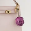 Blumen-Schlüsselanhänger – Pompon Orchideenblüte aus verschiedenen Materialien Blumen-Schlüsselanhänger – Pompon Orchideenblüte aus verschiedenen Materialien