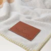 Farbblock-Decke Teak & Creme Lammwolle Damen Farbblock-Decke Teak & Creme Lammwolle Damen