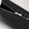 Gefaltete Mehrfach-Kartenbrieftasche aus schwarzem Hochglanzleder Gefaltete Mehrfach-Kartenbrieftasche aus schwarzem Hochglanzleder