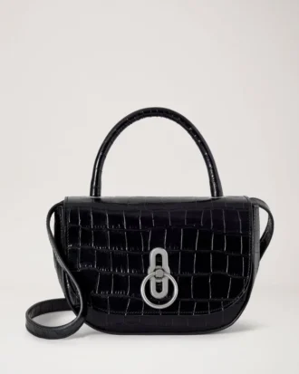 Kleine Amberley-Handtasche mit Griff, schwarz glänzend, kleines Krokodilmuster