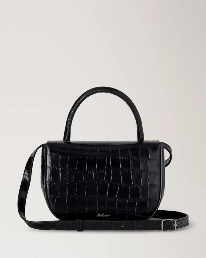 Kleine Amberley-Handtasche mit Griff, schwarz glänzend, kleines Krokodilmuster Kleine Amberley-Handtasche mit Griff, schwarz glänzend, kleines Krokodilmuster