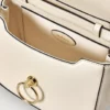 Kleine Amberley-Handtasche mit Tragegriff, in der Farbe „Eggshell Buttery Nappa“ Kleine Amberley-Handtasche mit Tragegriff, in der Farbe „Eggshell Buttery Nappa“
