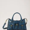 Kleine Roxanne aus blauem Hochglanzleder Kleine Roxanne aus blauem Hochglanzleder