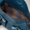 Kleine Roxanne aus blauem Hochglanzleder Kleine Roxanne aus blauem Hochglanzleder