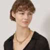 Lily-Kettenhalskette aus vergoldetem Edelstahl Lily-Kettenhalskette aus vergoldetem Edelstahl
