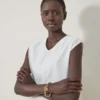 Lily Leder-Kettenarmband Medium Puderrosa Klein Klassische Narbung & vergoldeter Edelstahl Lily Leder-Kettenarmband Medium Puderrosa Klein Klassische Narbung & vergoldeter Edelstahl