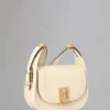 Mini Sadie Satchel Secondhand-Tasche aus eierschalenfarbenem, hochglänzendem Leder