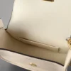 Mini Sadie Satchel Secondhand-Tasche aus eierschalenfarbenem, hochglänzendem Leder