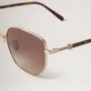 Rosie Sonnenbrille aus Gold- und braunem Metall mit Bio-Nylon-Gläsern Rosie Sonnenbrille aus Gold- und braunem Metall mit Bio-Nylon-Gläsern