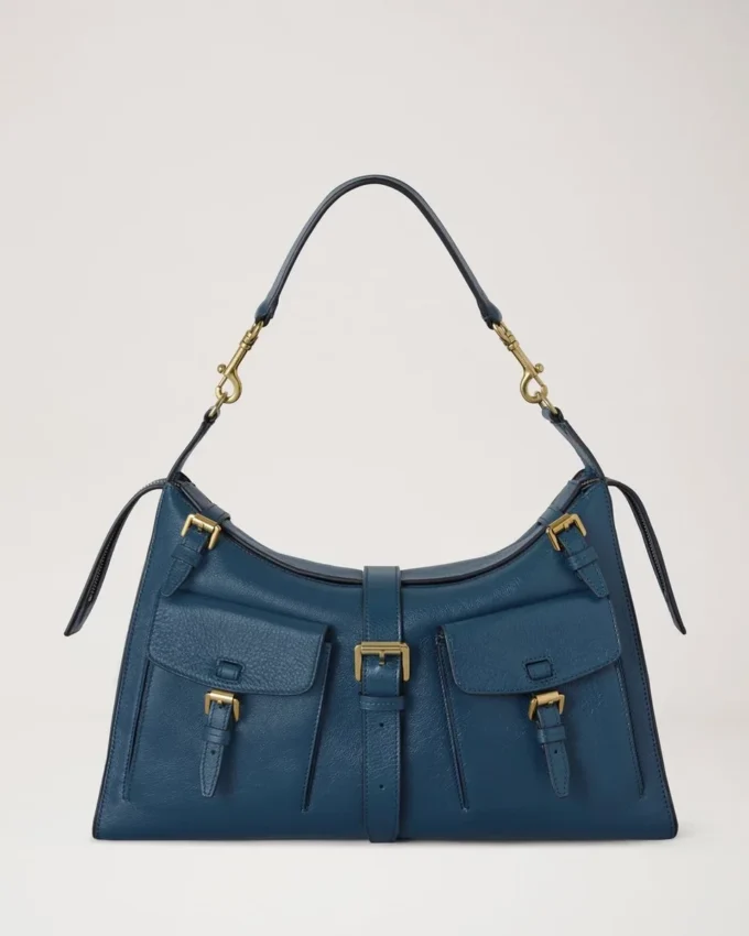 Roxanne-Umhängetasche aus blauem Hochglanzleder Roxanne-Umhängetasche aus blauem Hochglanzleder