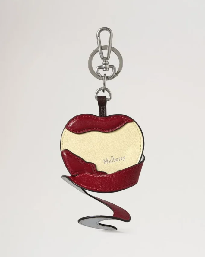 Schlüsselanhänger „Obst schälen“ – Apfel, mehrfarbig, Materialmix Schlüsselanhänger „Obst schälen“ – Apfel, mehrfarbig, Materialmix